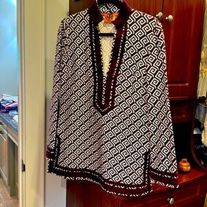 Size 4 preowned but worn in once. Tory Burch at her best size 4.